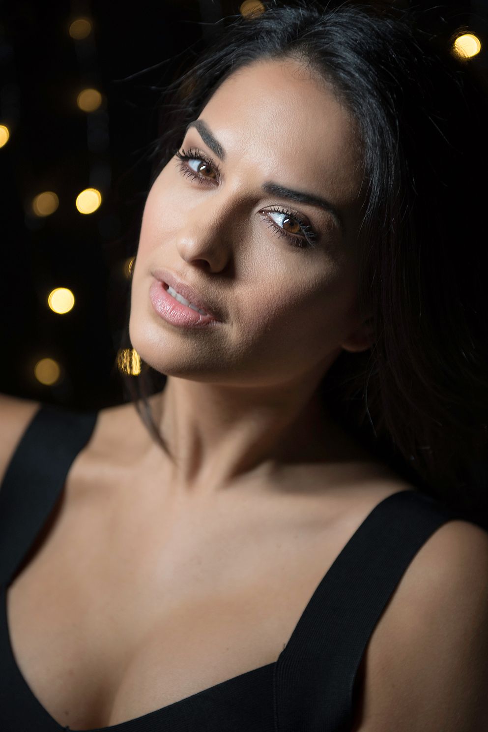 model headshot with bokeh in background