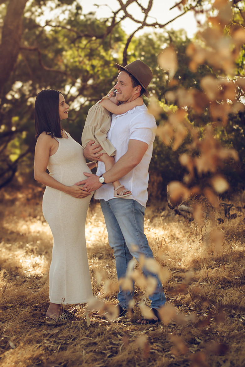 Expecting couple with toddler in golden sunset, Perth maternity photography by Fyrefly Photography