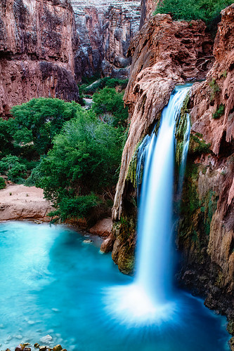 Majestic Havasupai waterfall in a turquoise pool