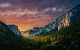 Vibrant sunrise over Yosemite Valley from Tunnel View in Yosemite National Park California featuring