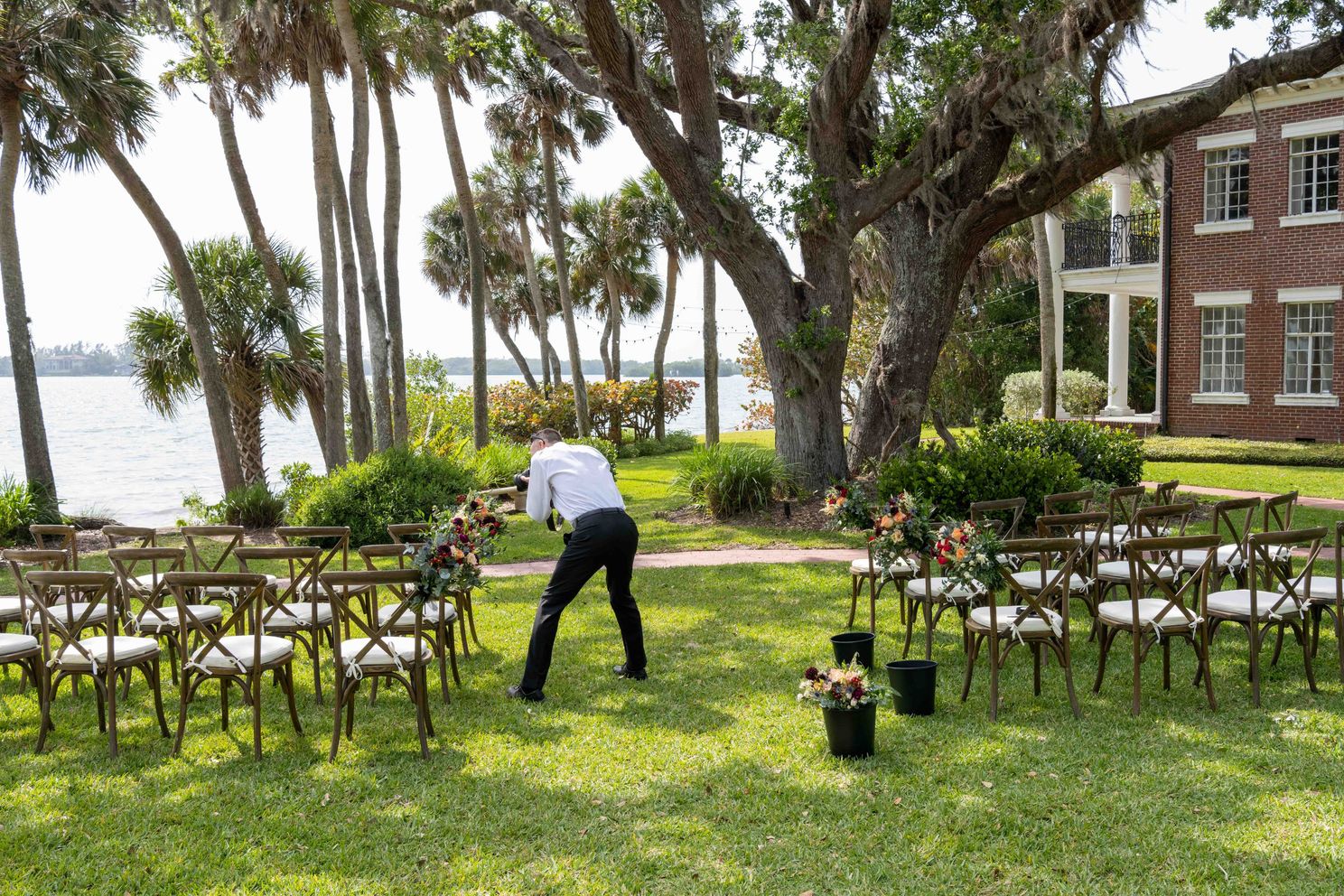 Mike capturing some detail photos of the flowers before a wedding at Bay Preserve at Osprey