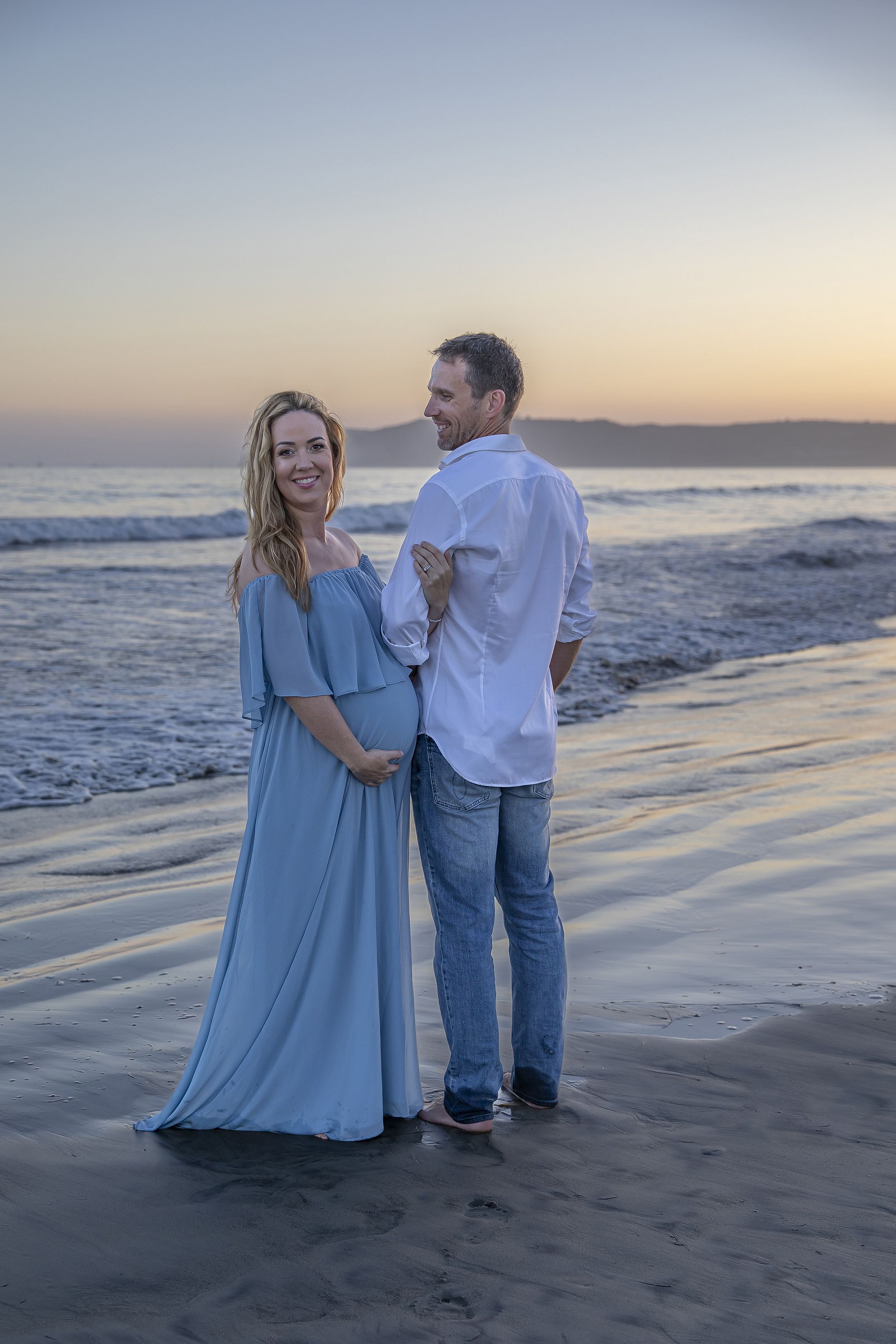 Coronado Beach maternity shoot, 37 weeks at sunset. Husband and wife maternity shoot