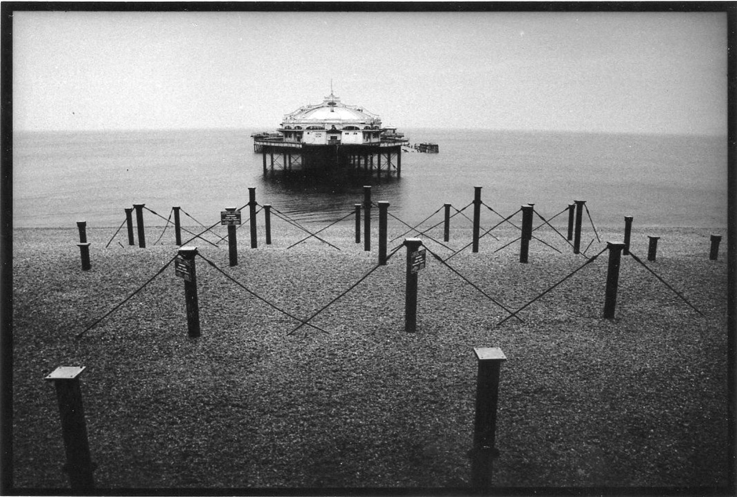 West Pier Brighton from the beach. Scan from 35mm Ilford HP5 negative. Shot  around 1995