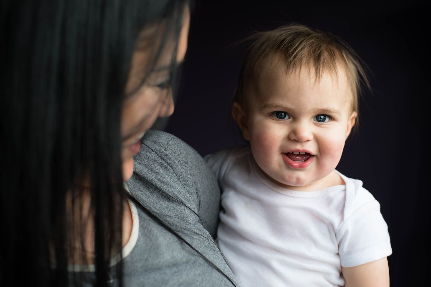 mom and son sharing a laugh