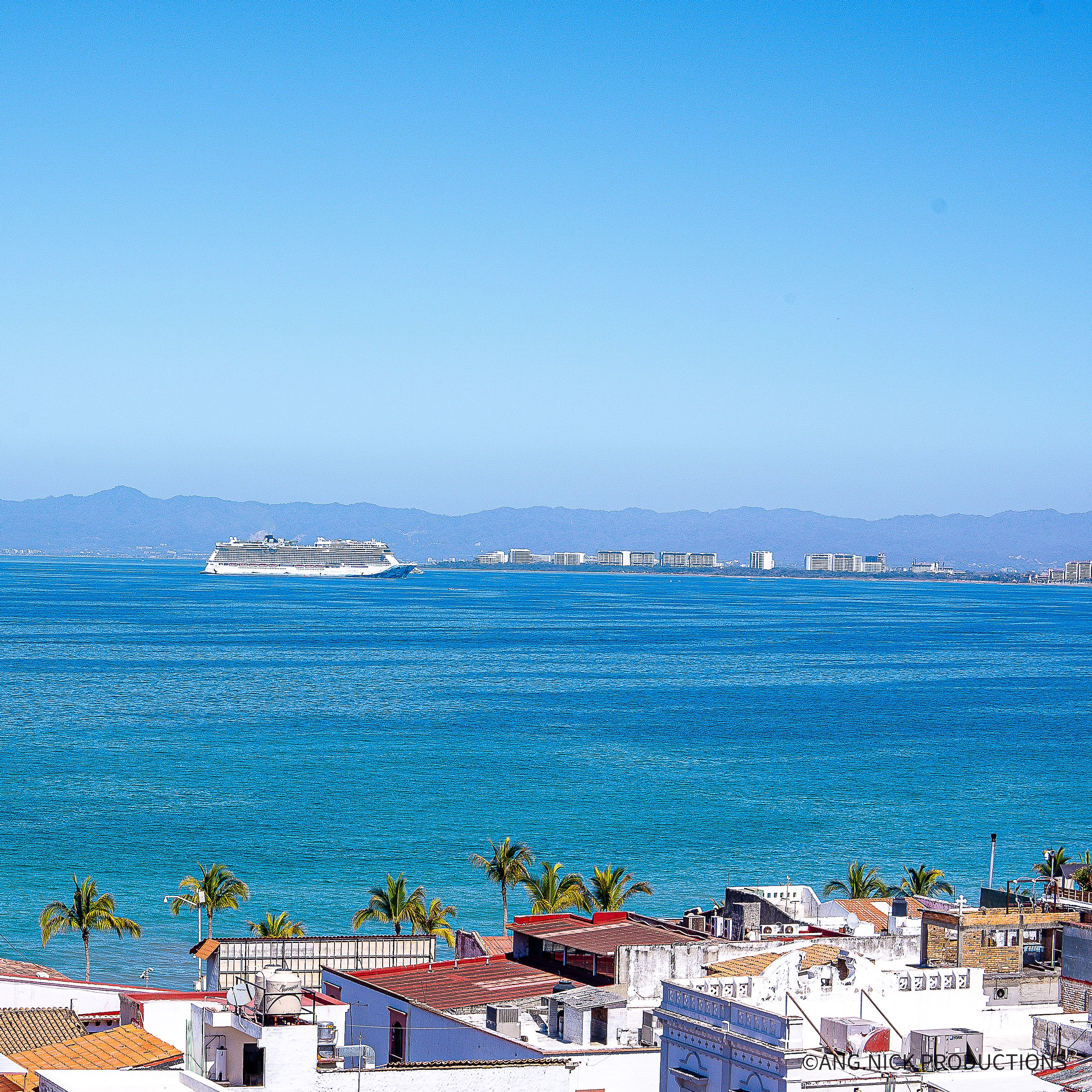 Stunning view of modern buildings and the expansive ocean in a Mexican coastal city