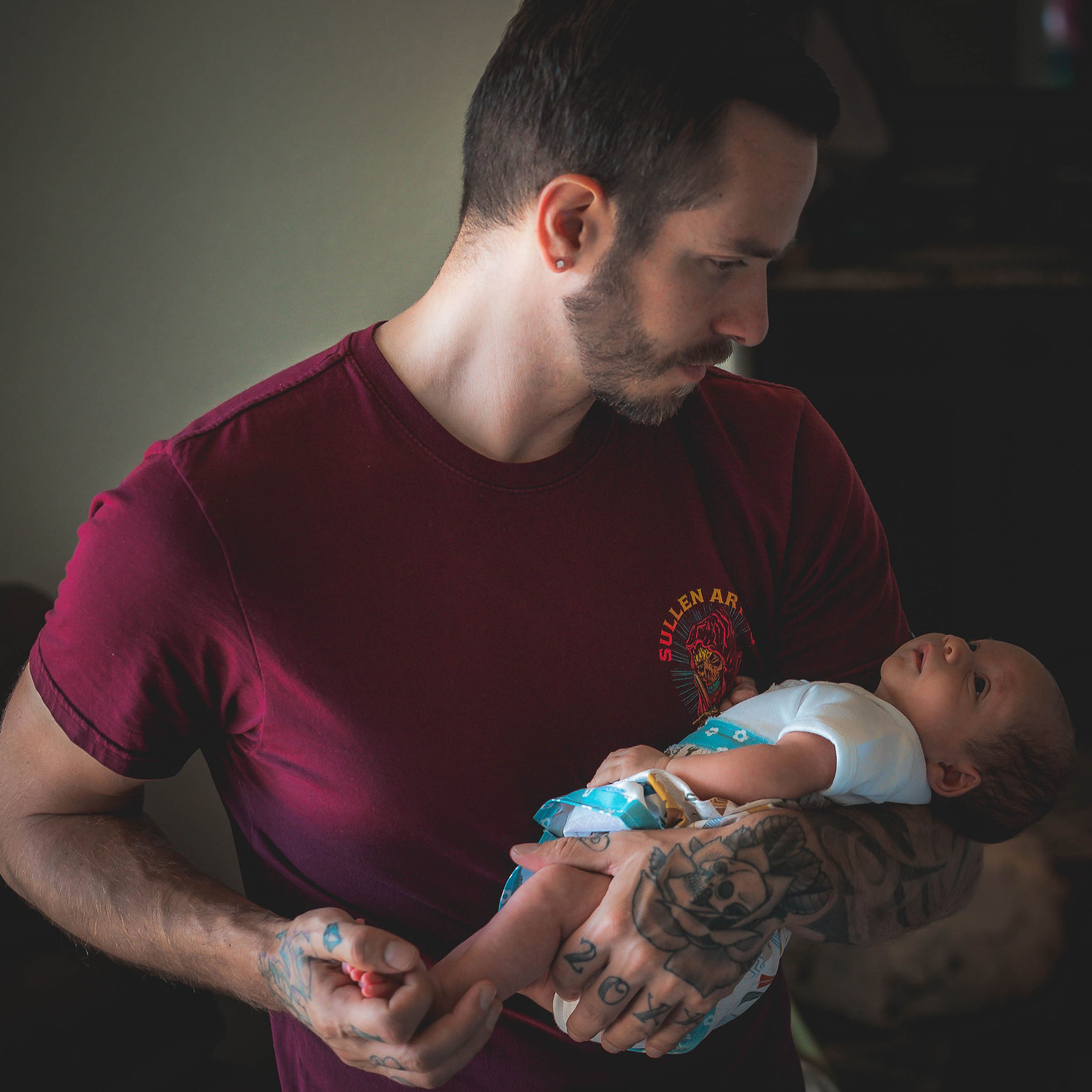 Father holding a baby
