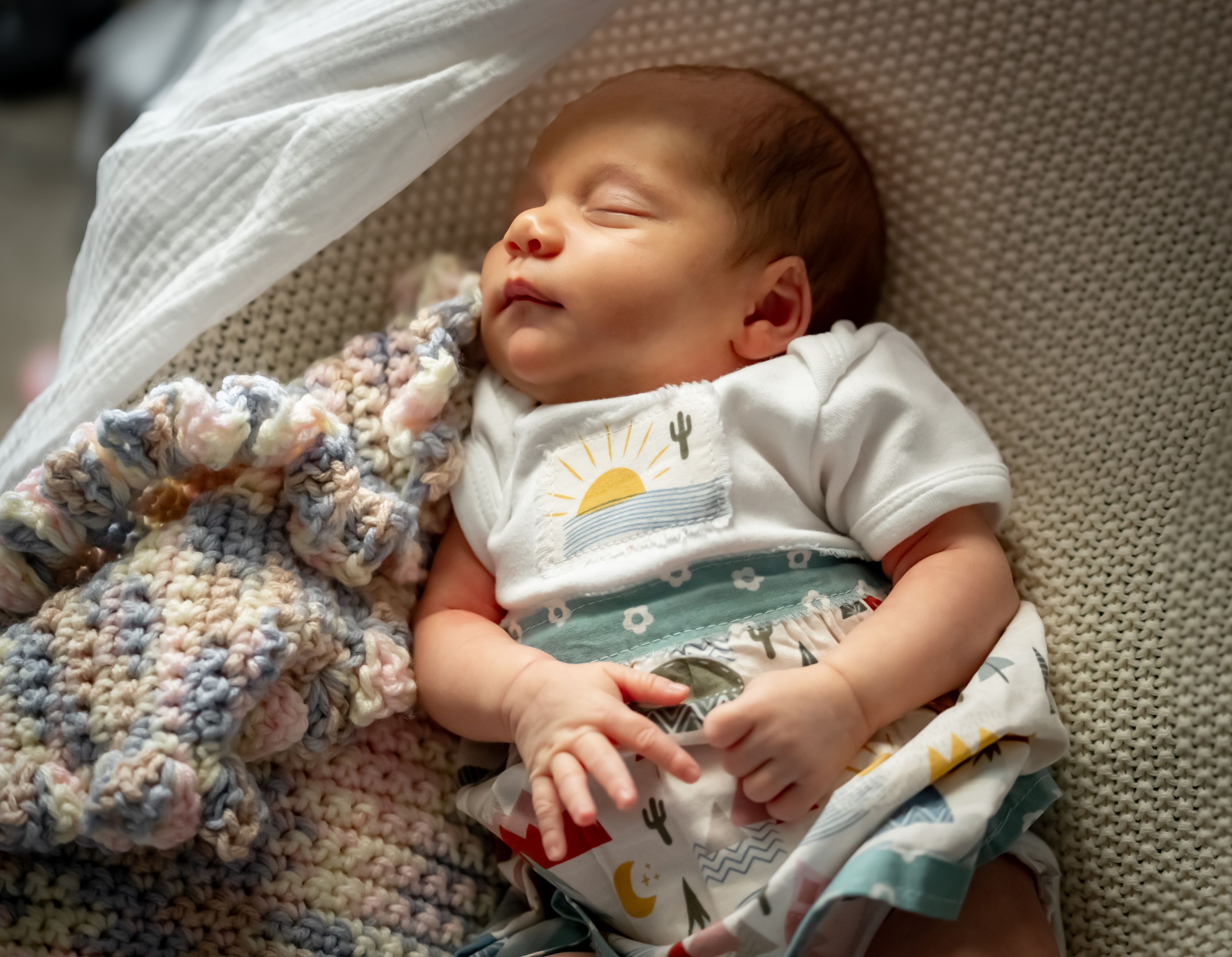 Newborn baby peacefully sleeping