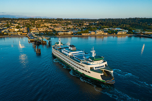 The Puyallup arrives at the Edmonds Ferry Terminal at dusk, dron