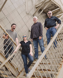 Cleveland OH rock band duo standing on stairs in a V formation