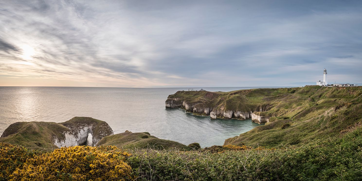 Photo looking across Silex Bay at Flamborough Head North Yorkshire taken at dawn sunrise