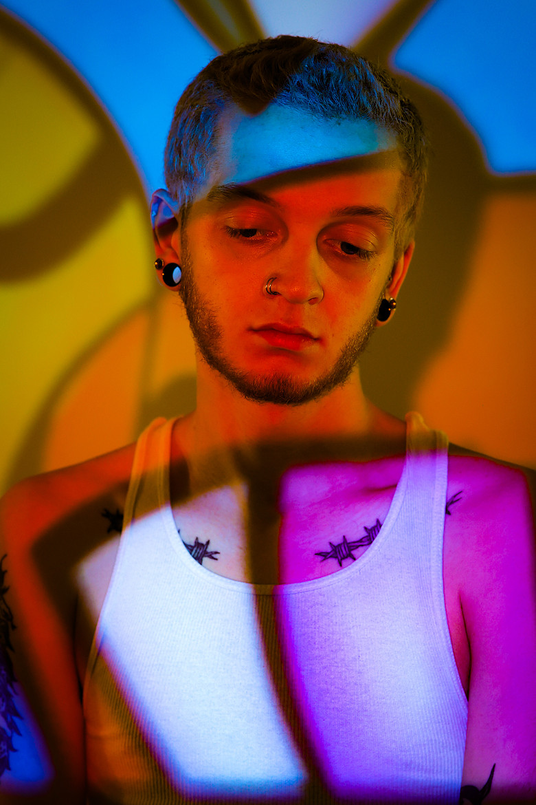 Photo of man with color projected