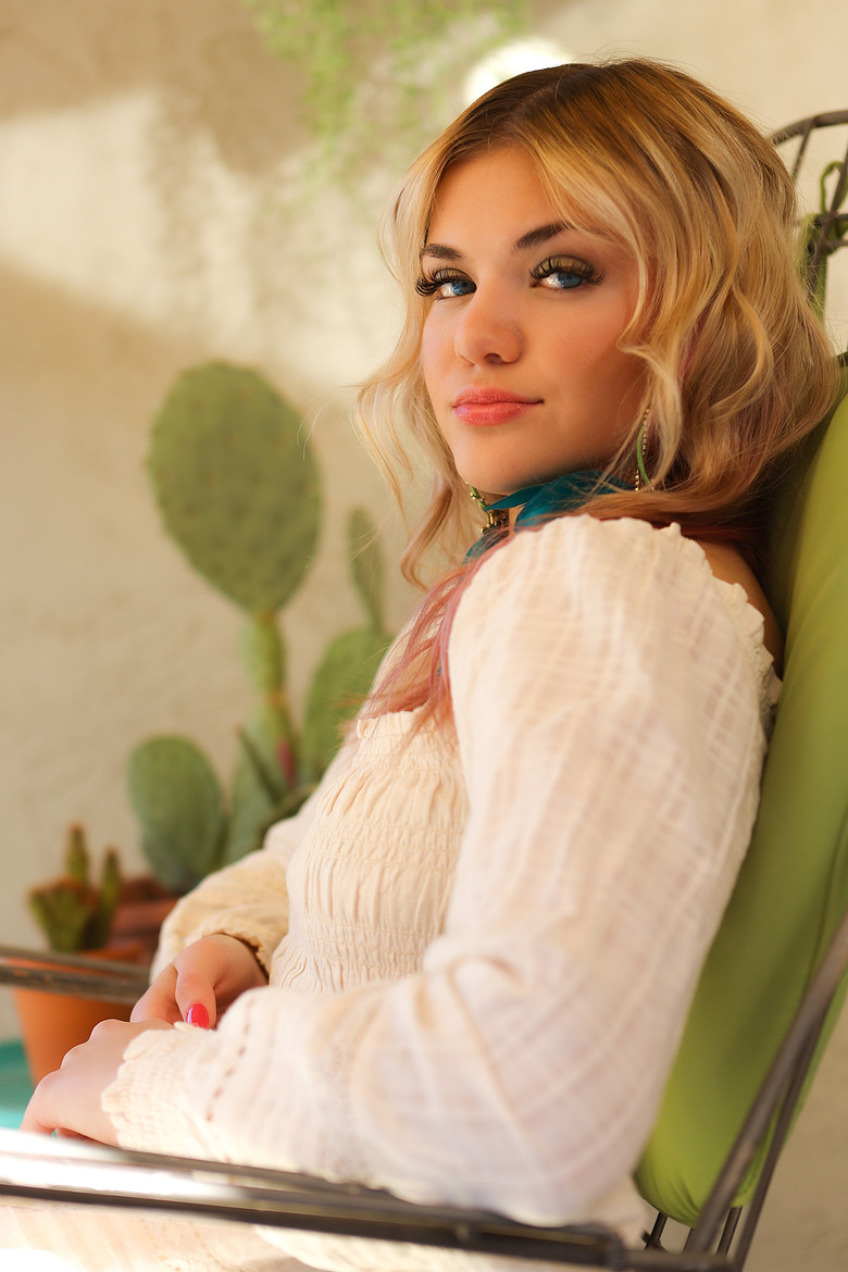 Portrait of blonde in a chair