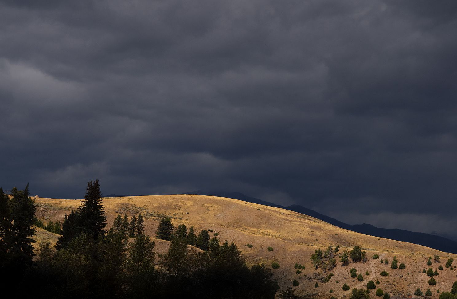 Storm Clouds Over Grassy Knoll