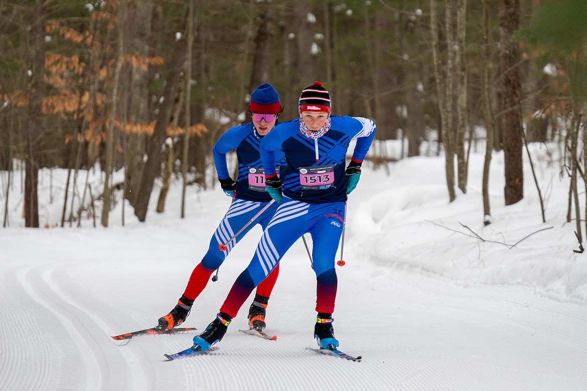 Two skiers rip across groomed corduroy at the 2025 North American VASA in Traverse City, Michigan