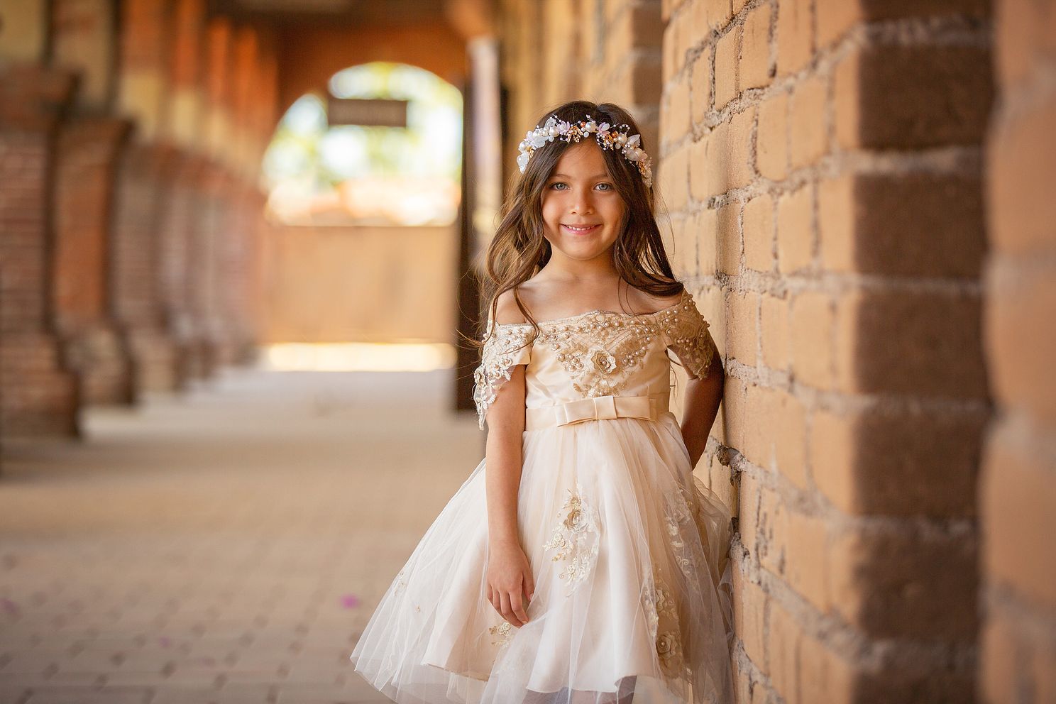 SJC-mission-child-brick-wall-photography