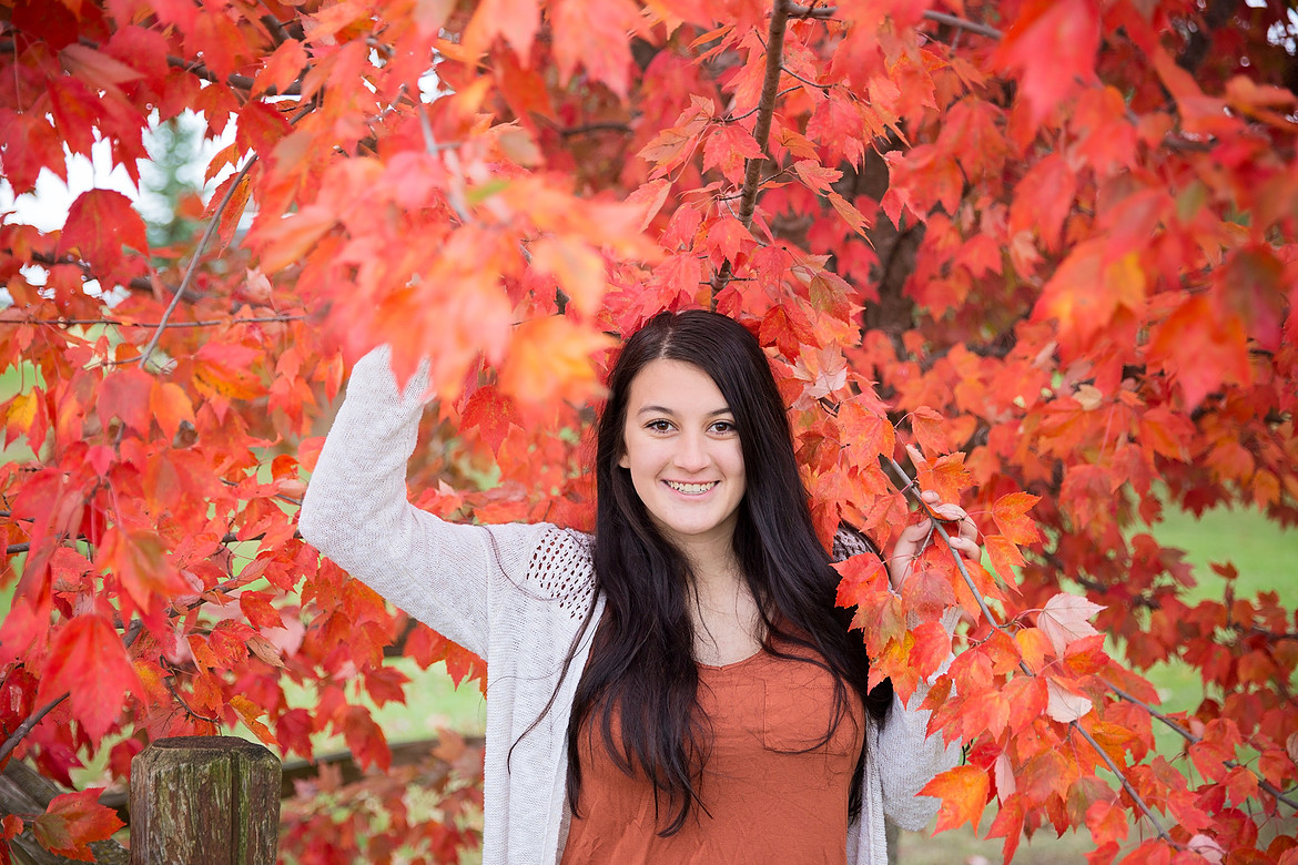 Senior girl taken in the Fall by Memories for Life Photography, LLC.