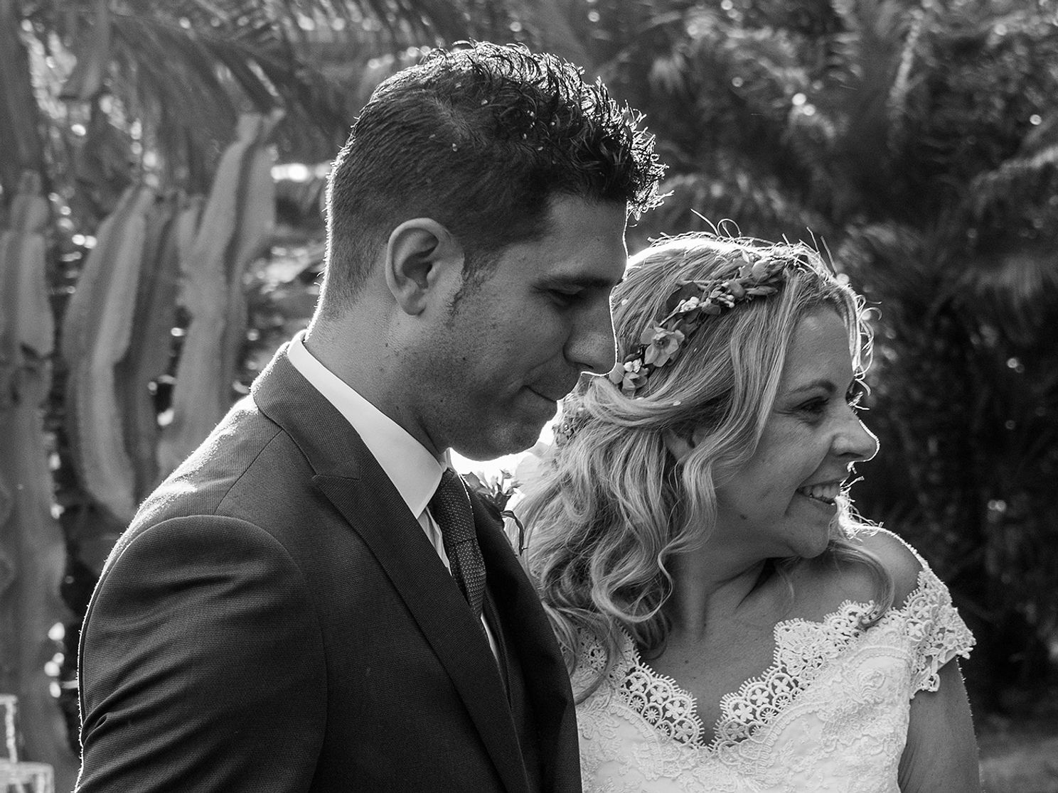 bride and groom black and white candid.jpg