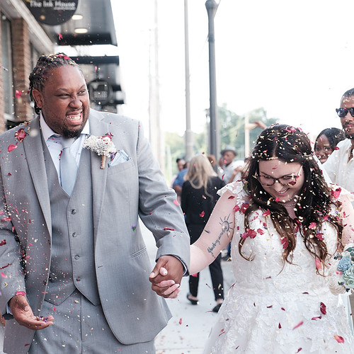 Bride and Groom Flower Toss Grand Exit.jpg