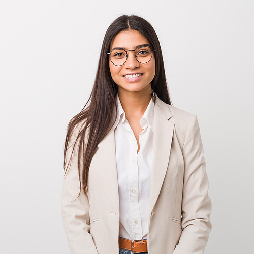 Young business arab woman isolated against a white background happy, smiling and cheerful.