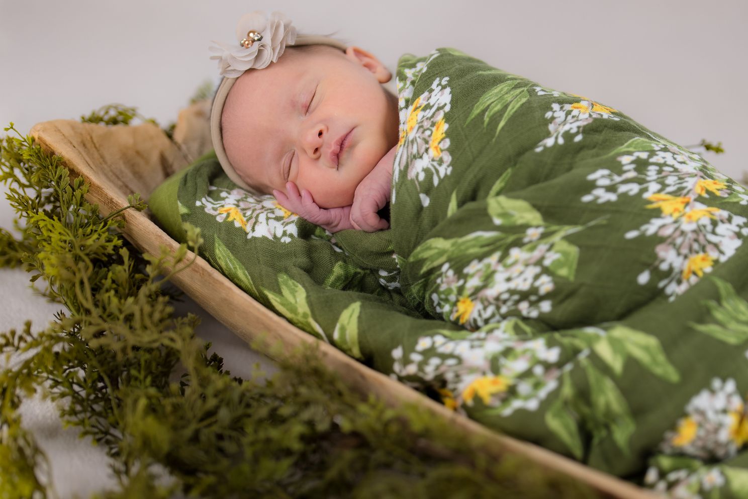 Newborn Baby Girl in Floral Green Wrap
