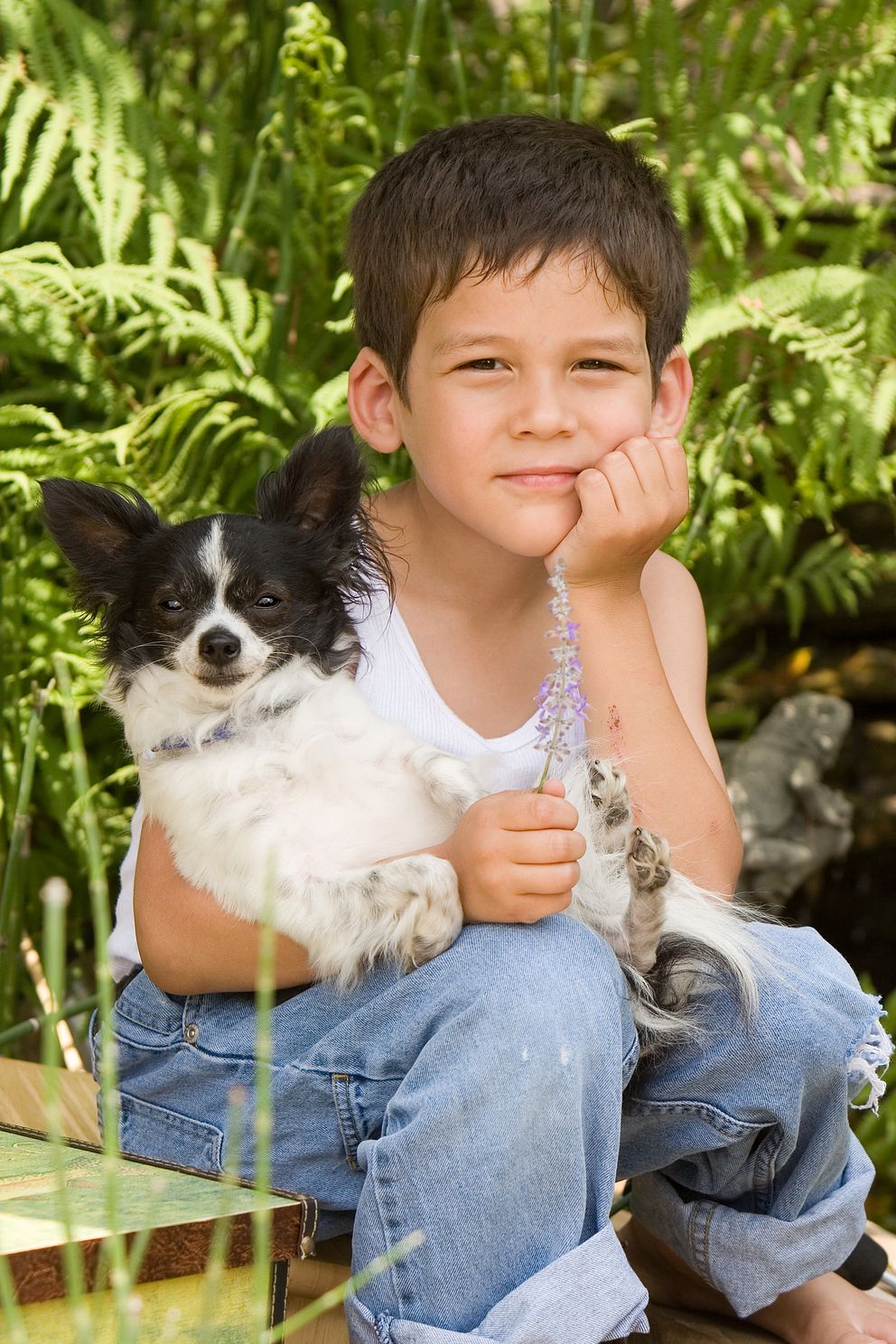 Picture of boy holding his dog