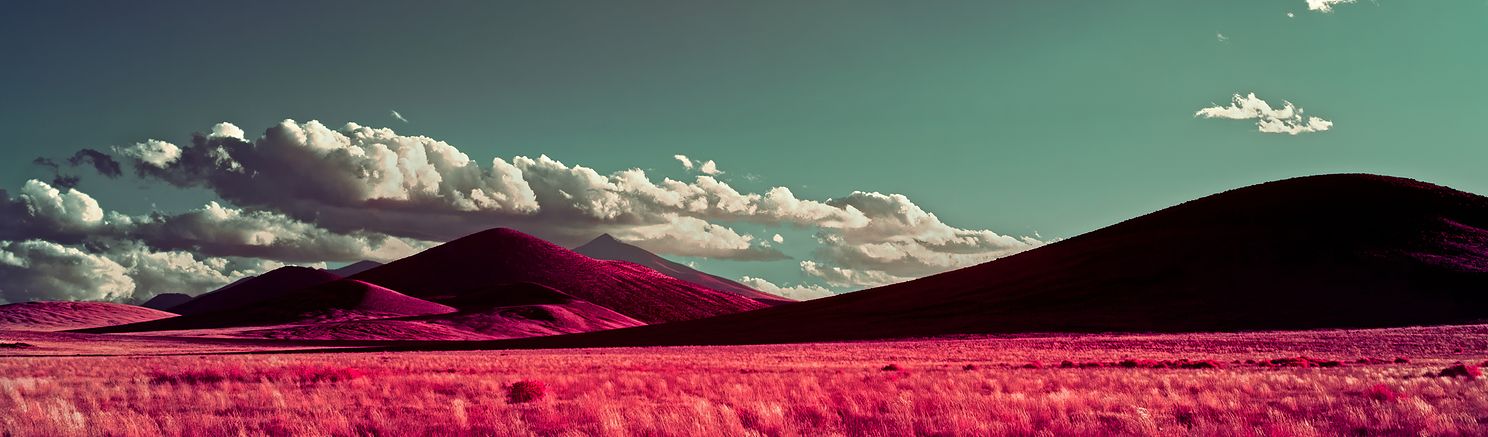 Cinder cones glow red in this infrared image of the San Francisco volcanic field in northern AZ