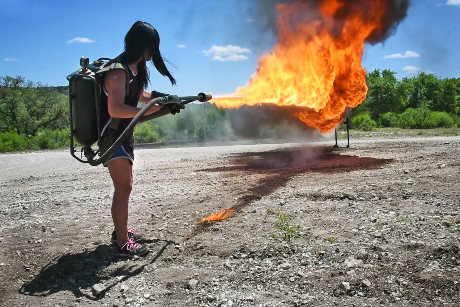 a person using a flamethrower