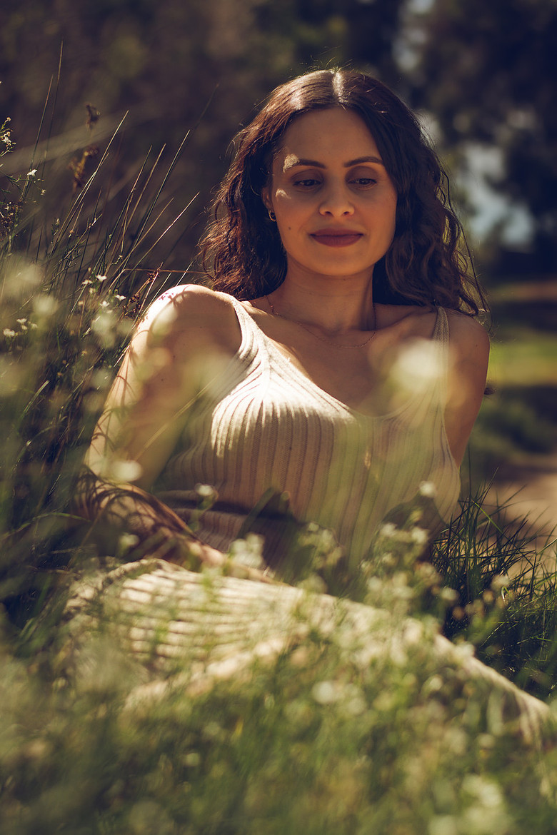 Natural light portrait photography Perth - woman in wildflower field by Fyrefly Photography