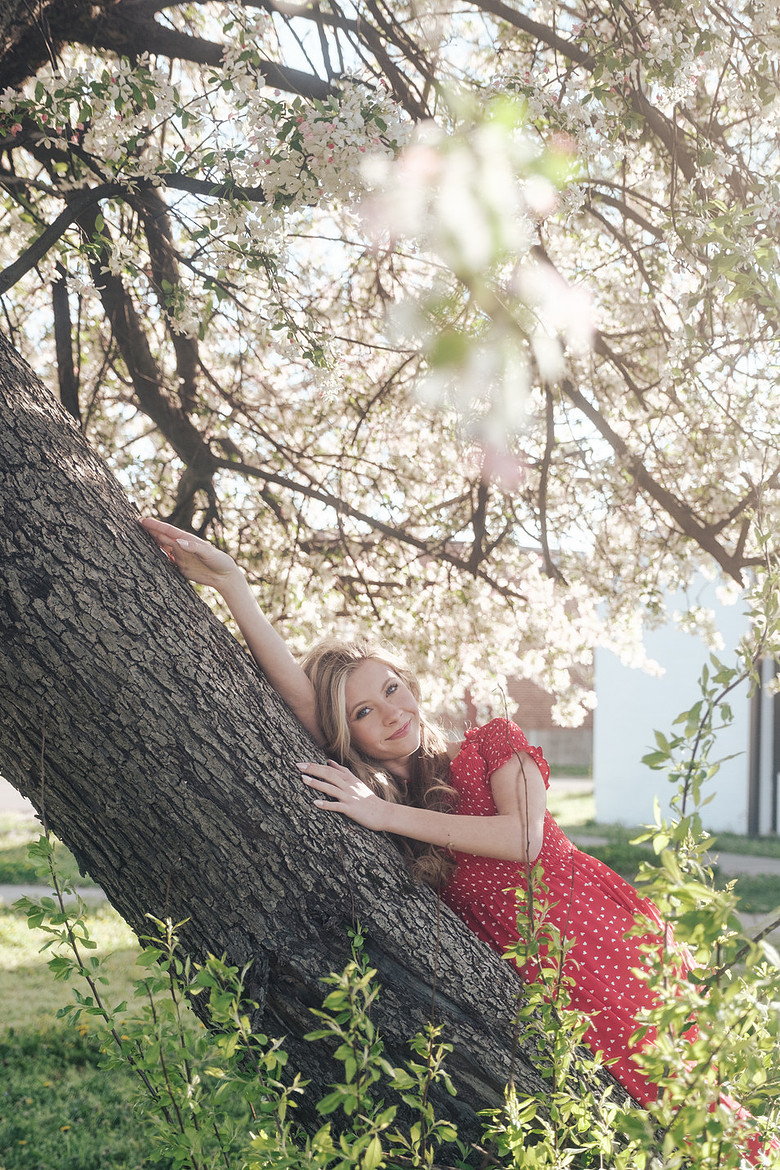 Senior photo spring cherry blossom sedalia missouri light and airy