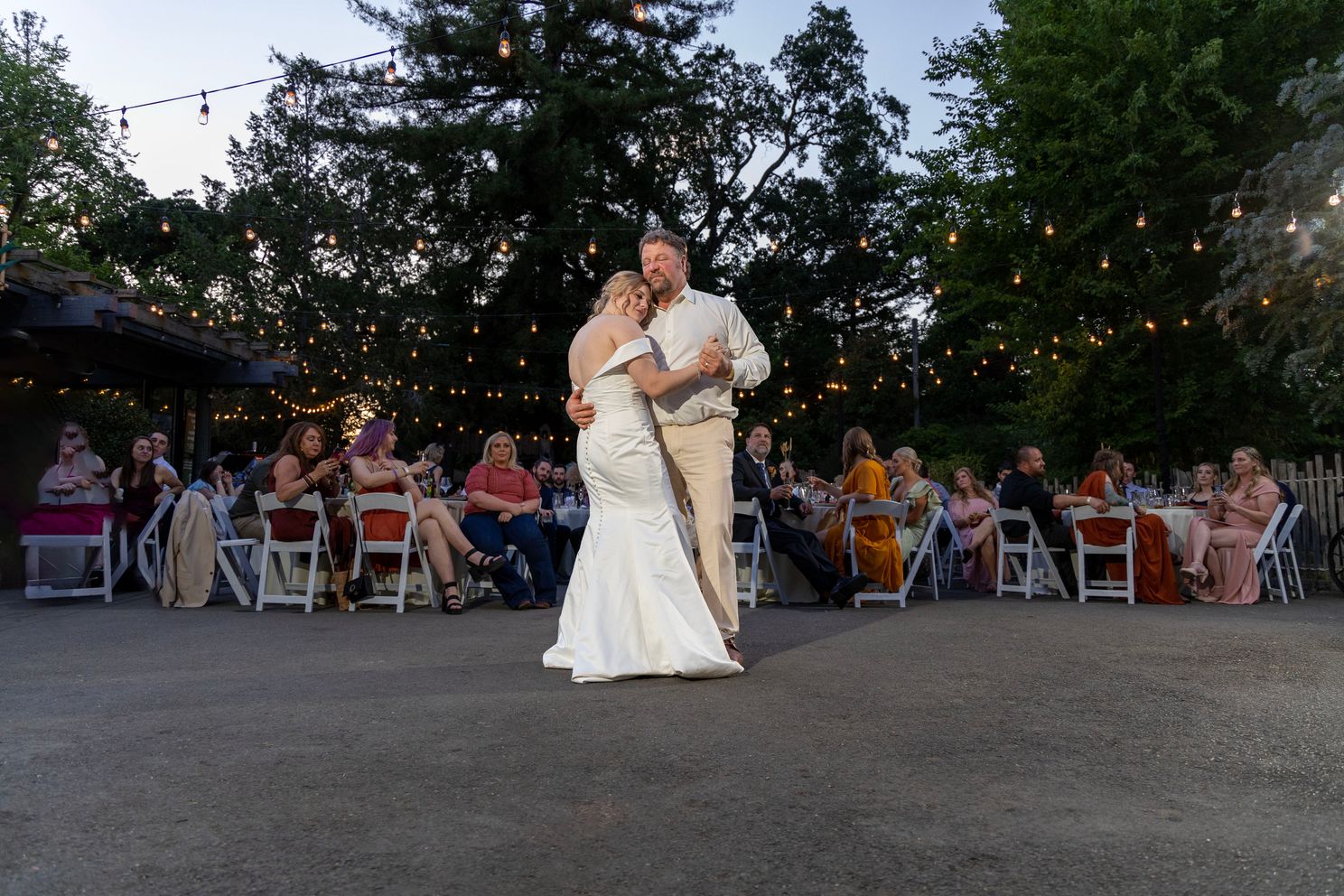 Wedding at Sacramento Zoo. First dance at the reception in the courtyard. Photo and video.