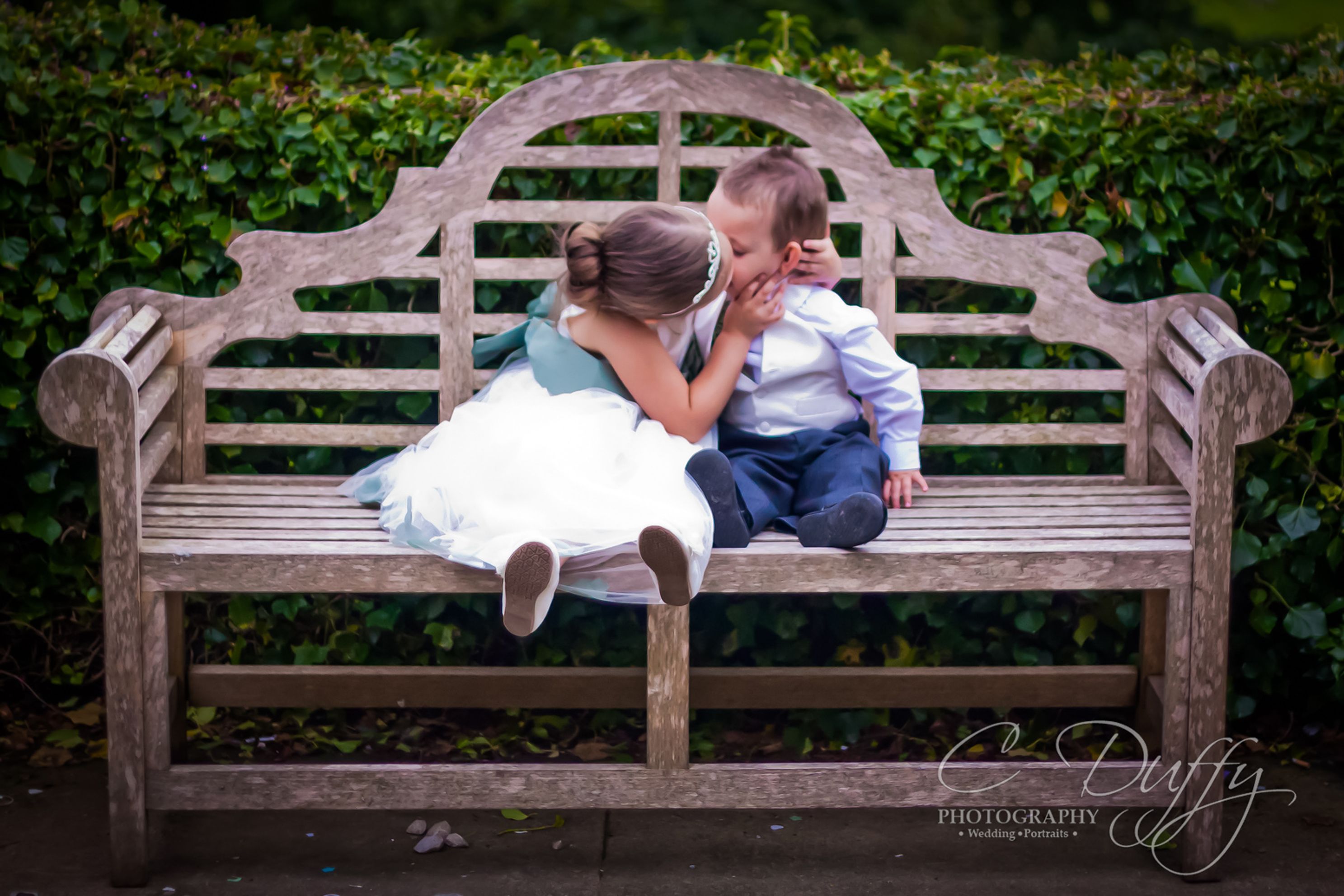Natural moment of love captured by Mitton Hall wedding photographer