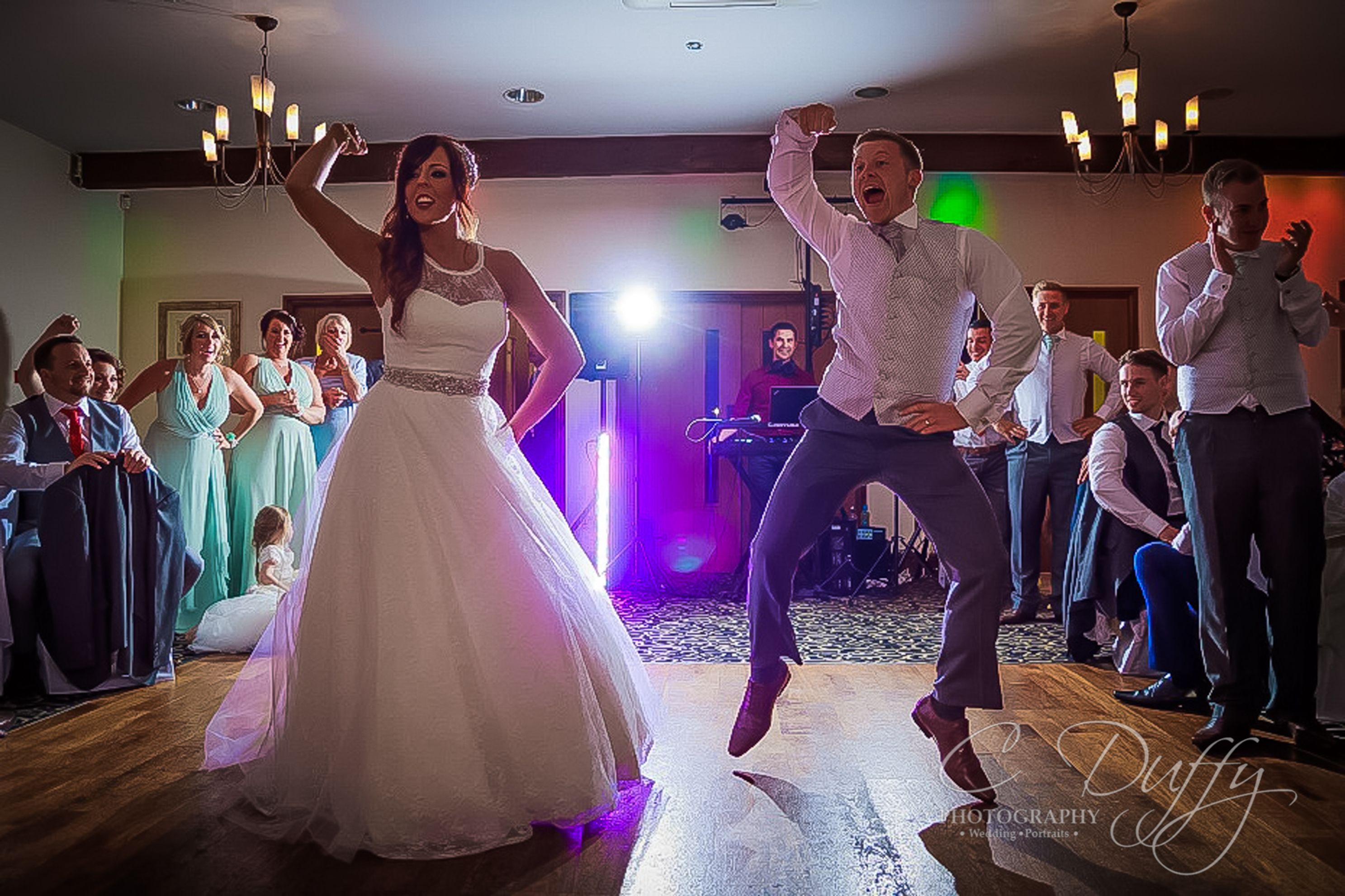 Bride and groom fun first dance captured by wedding photographer