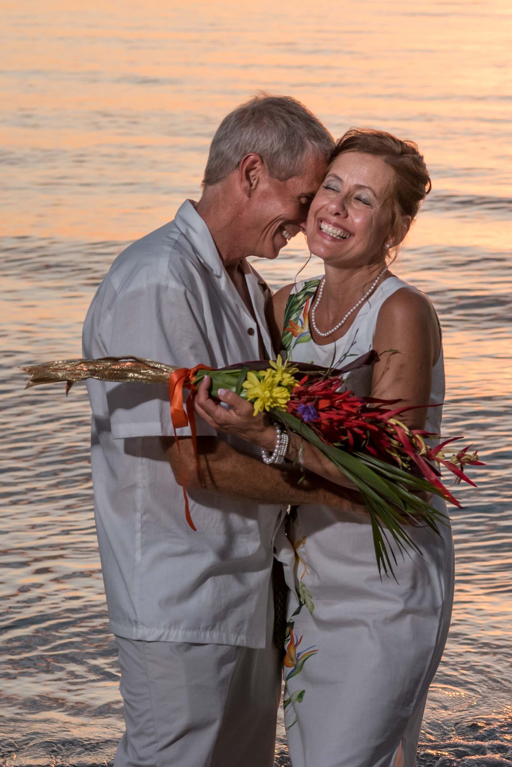 Naples wedding photography of bride and groom on beach in Naples