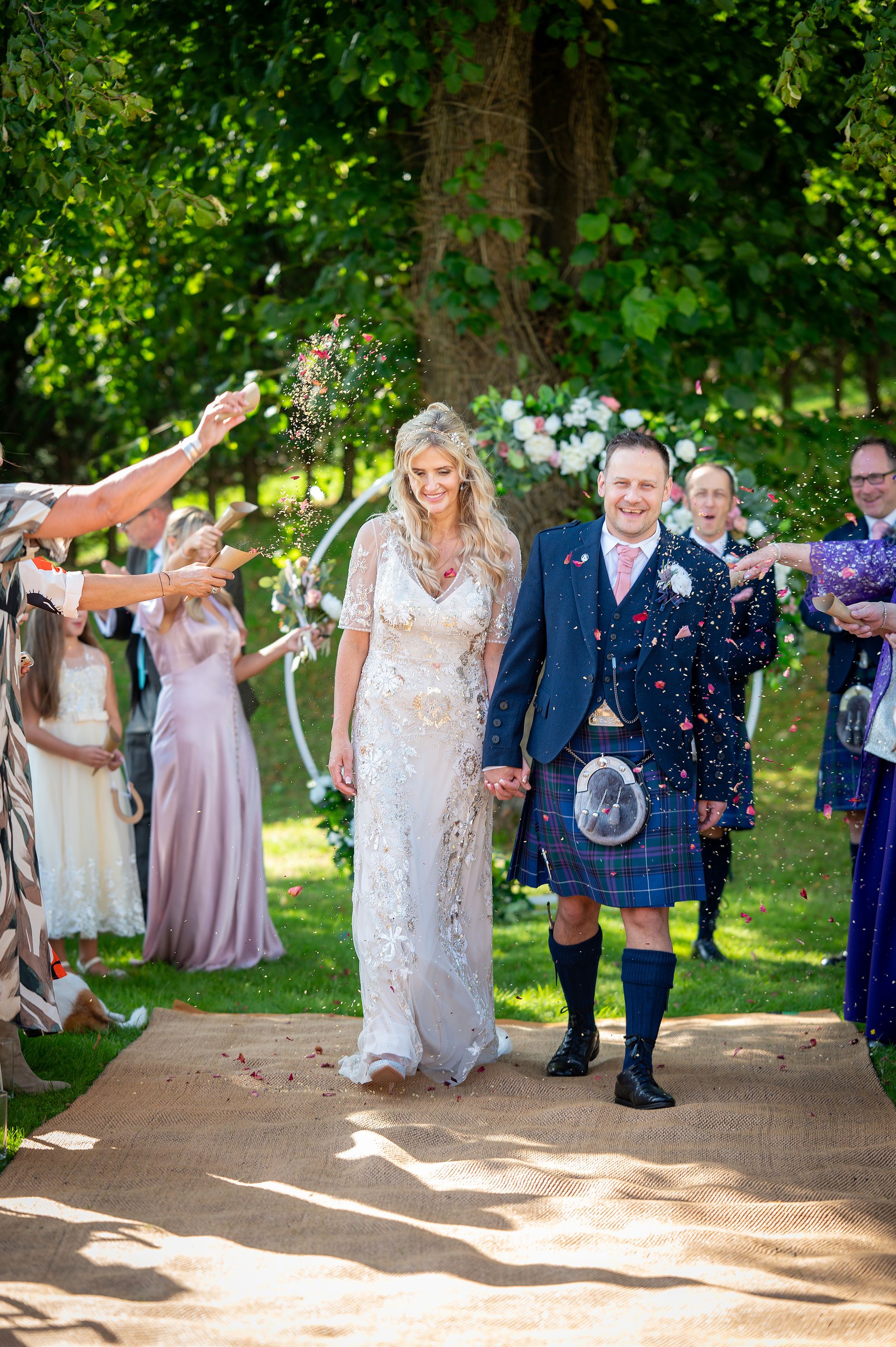 Wedding moments - confetti photo - happy couple - Wedding Photography Scottish Borders
