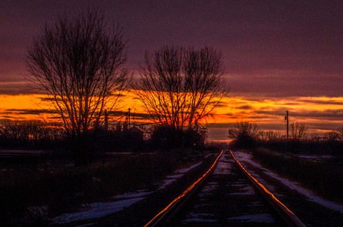Tracks of Fire  A sunset highlights train tracksjpg