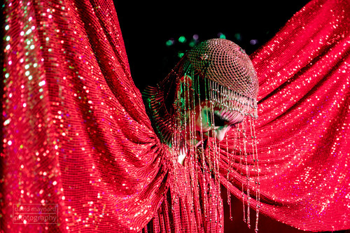 Vanity Fairy at The Windmill Brixton, Red glittery costume in a butterfly pose