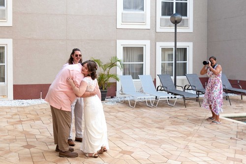 Stephanie photographs the first look for a bride with her father and brother