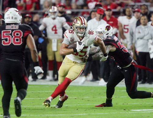 ers tight end George Kittle  is on his way to scoring a touchdown during the San Francisco ers  defe