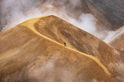 Geyer and Mountain Range in Iceland
