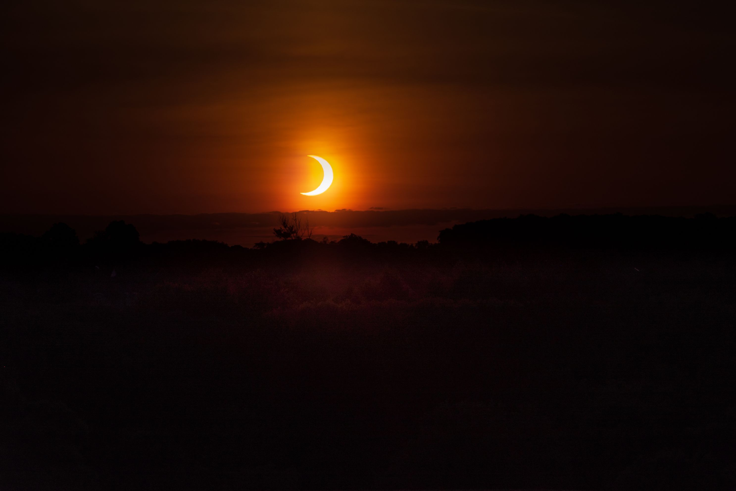 Early sunrise of partial solar eclipse
