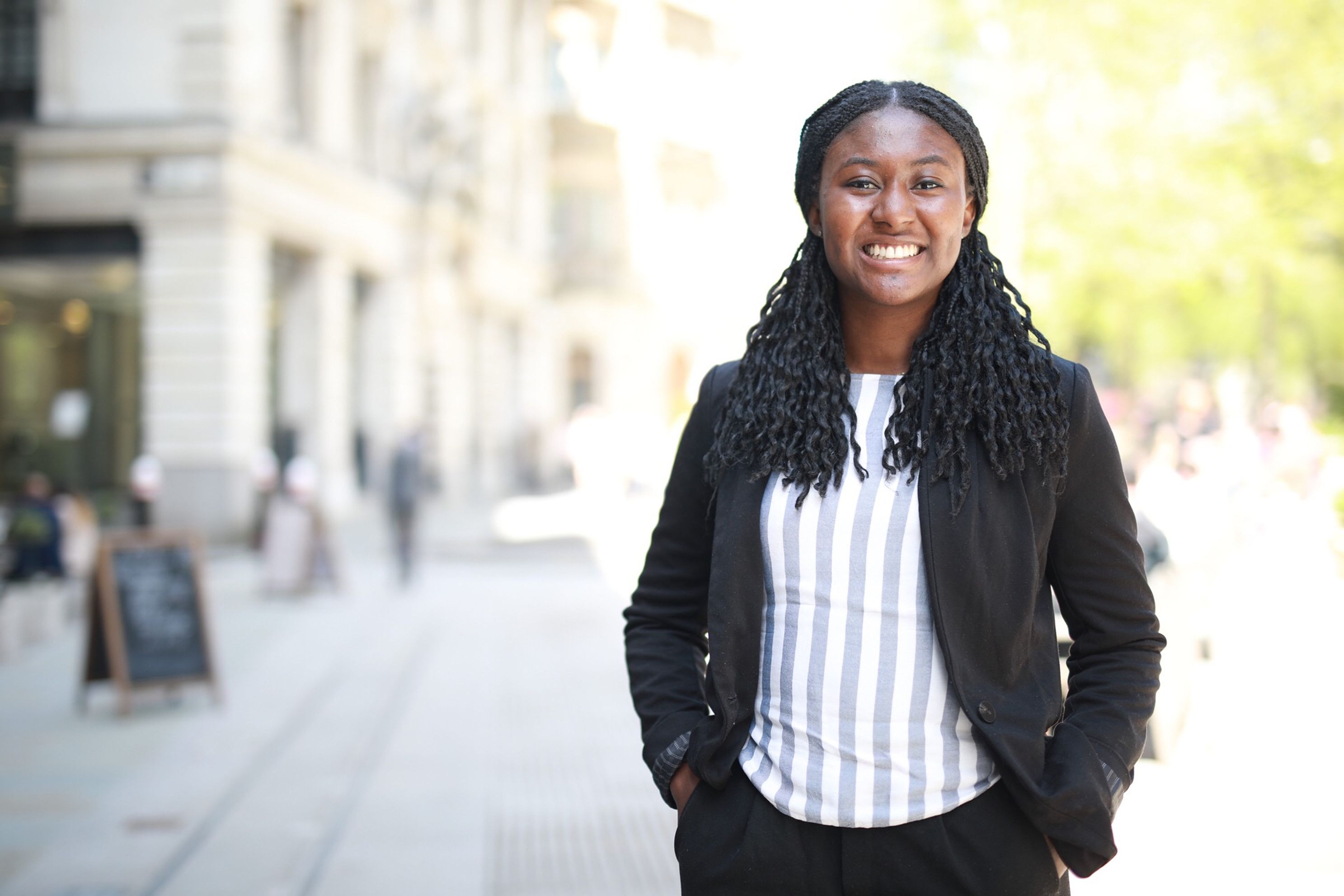 Lady on a street location with a stunning smile